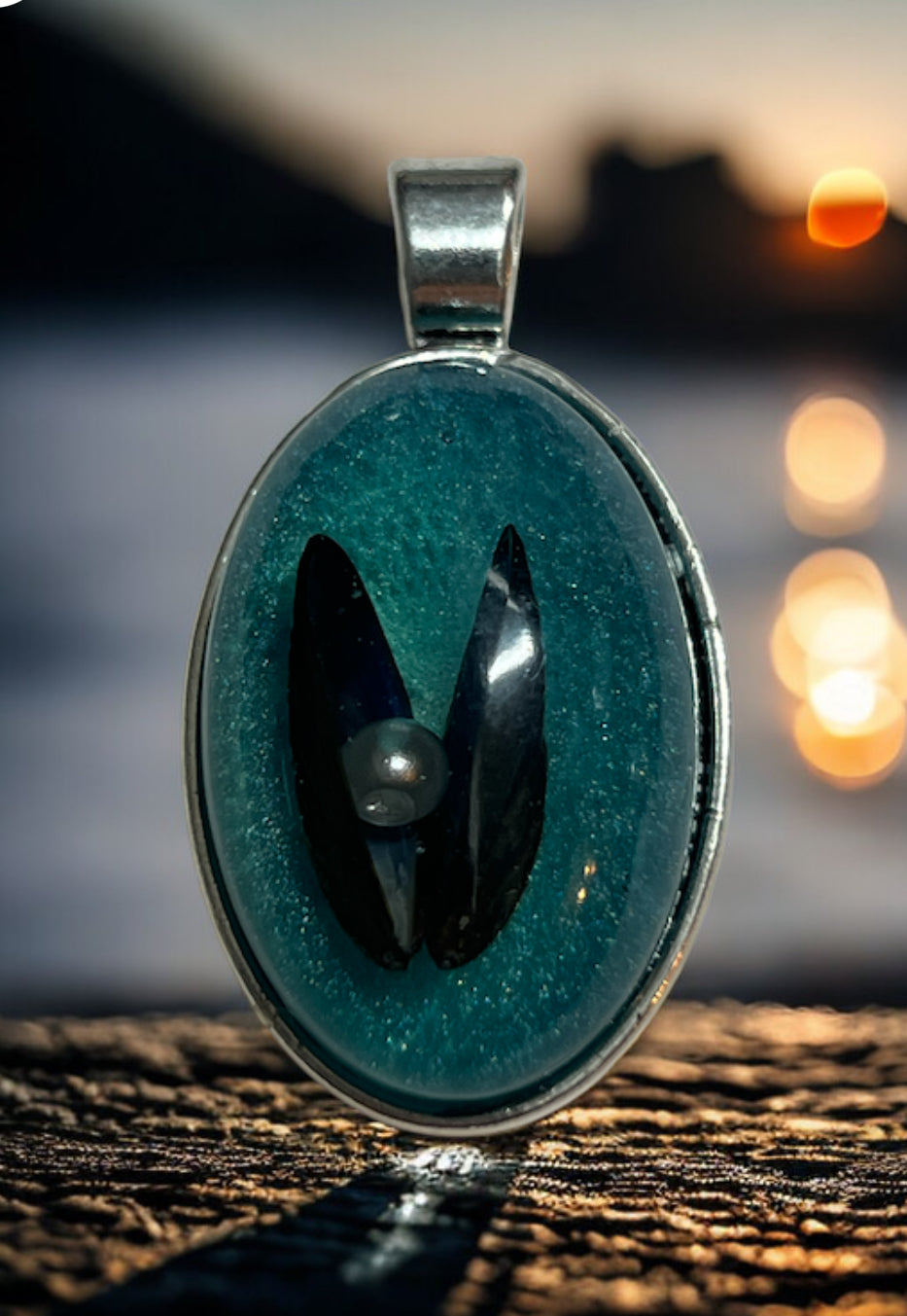 Mussel shell pendant.