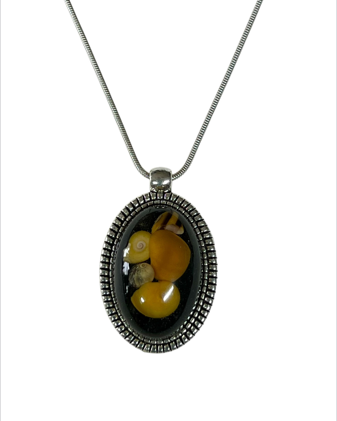 Sunset beach pendants. Yellow shells from the island of Whalsay.