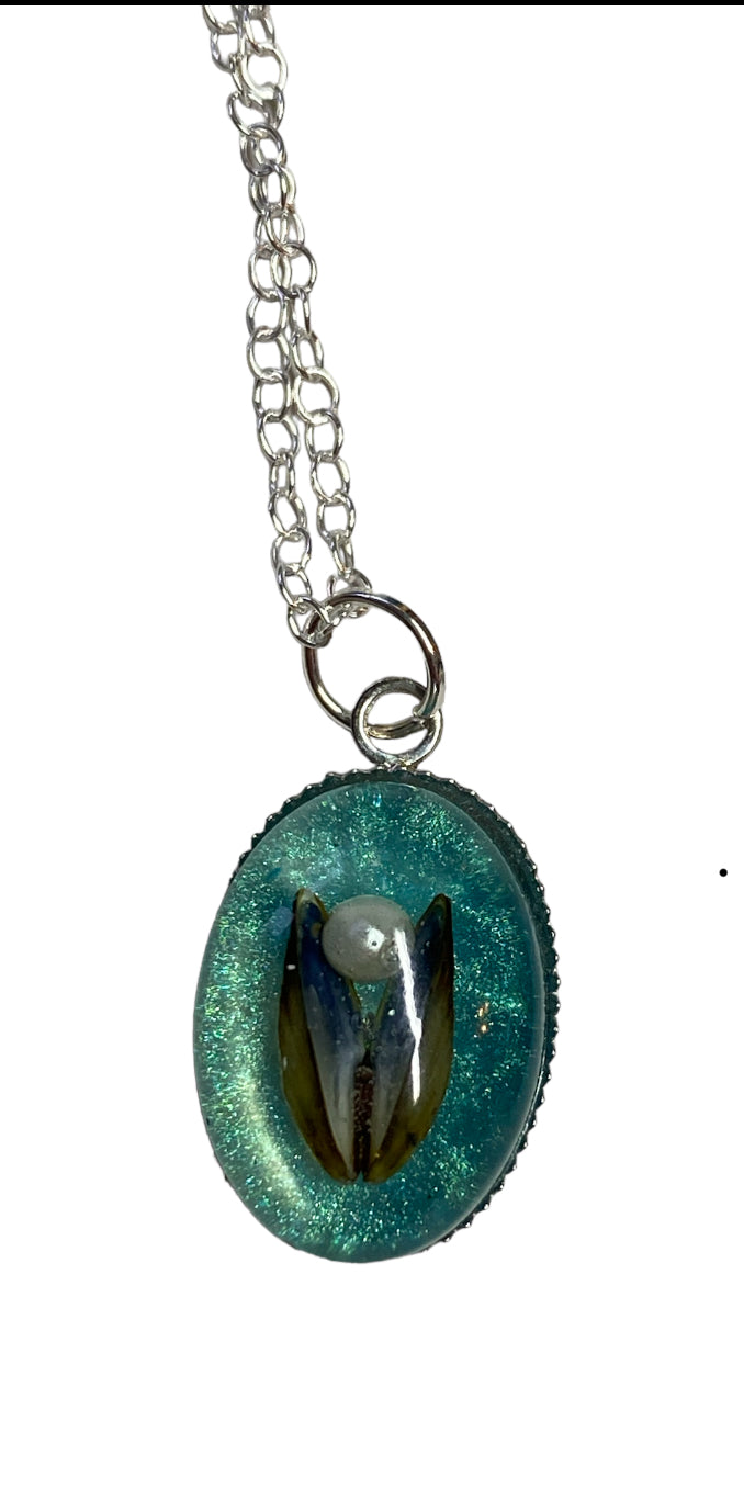Mussel shell pendant.