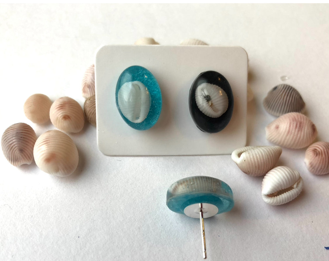Cowrie Shell studs.