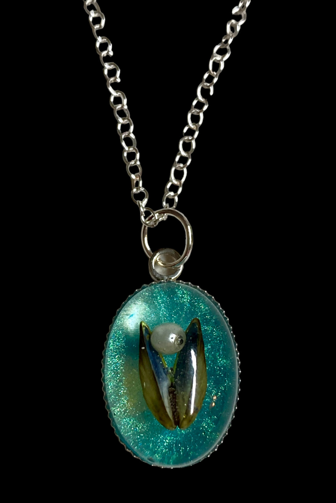 Mussel shell pendant.