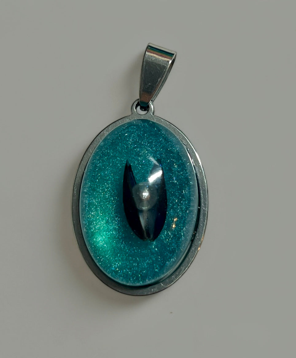 Mussel shell pendant.