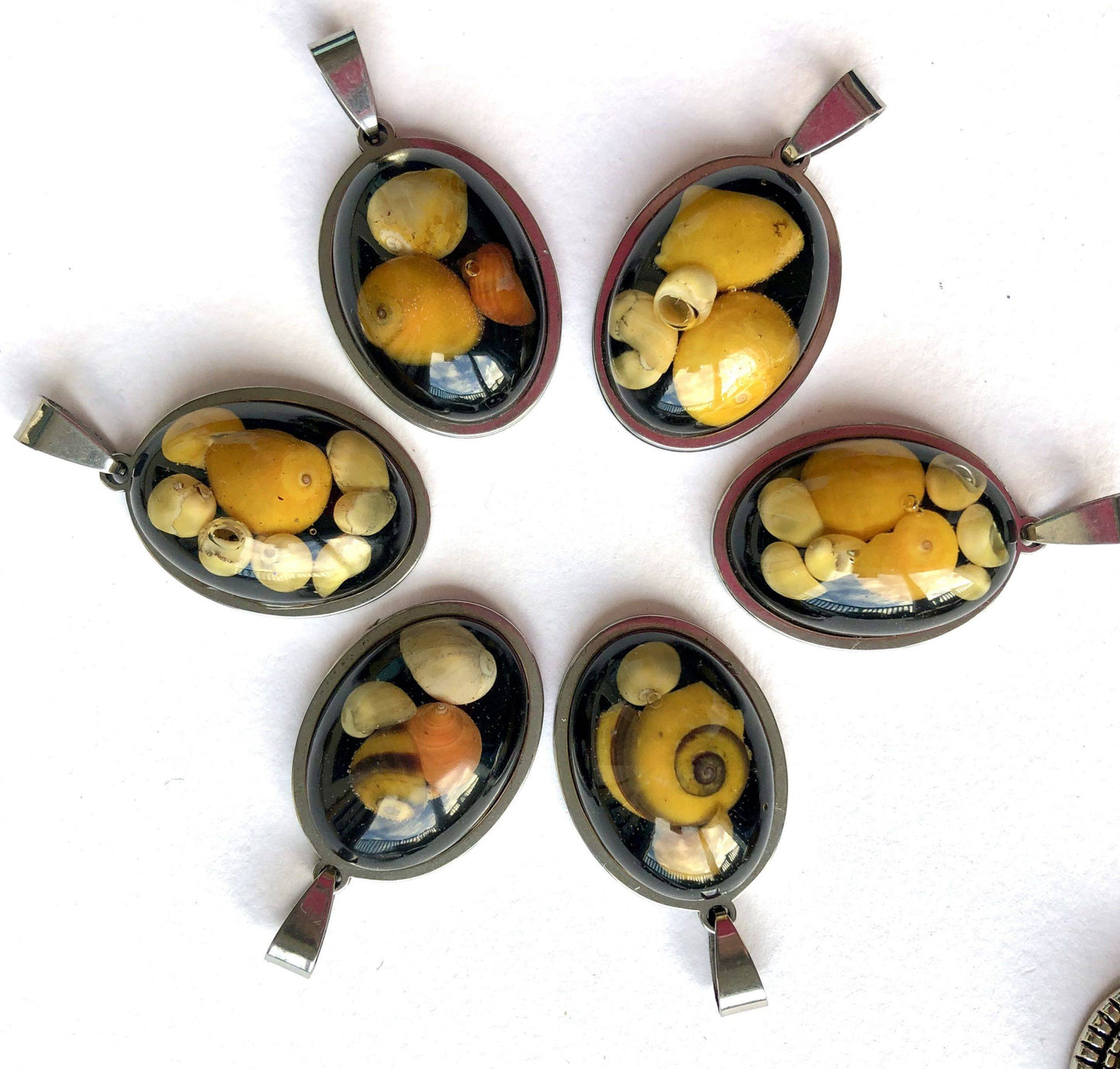 yellow shell pendants