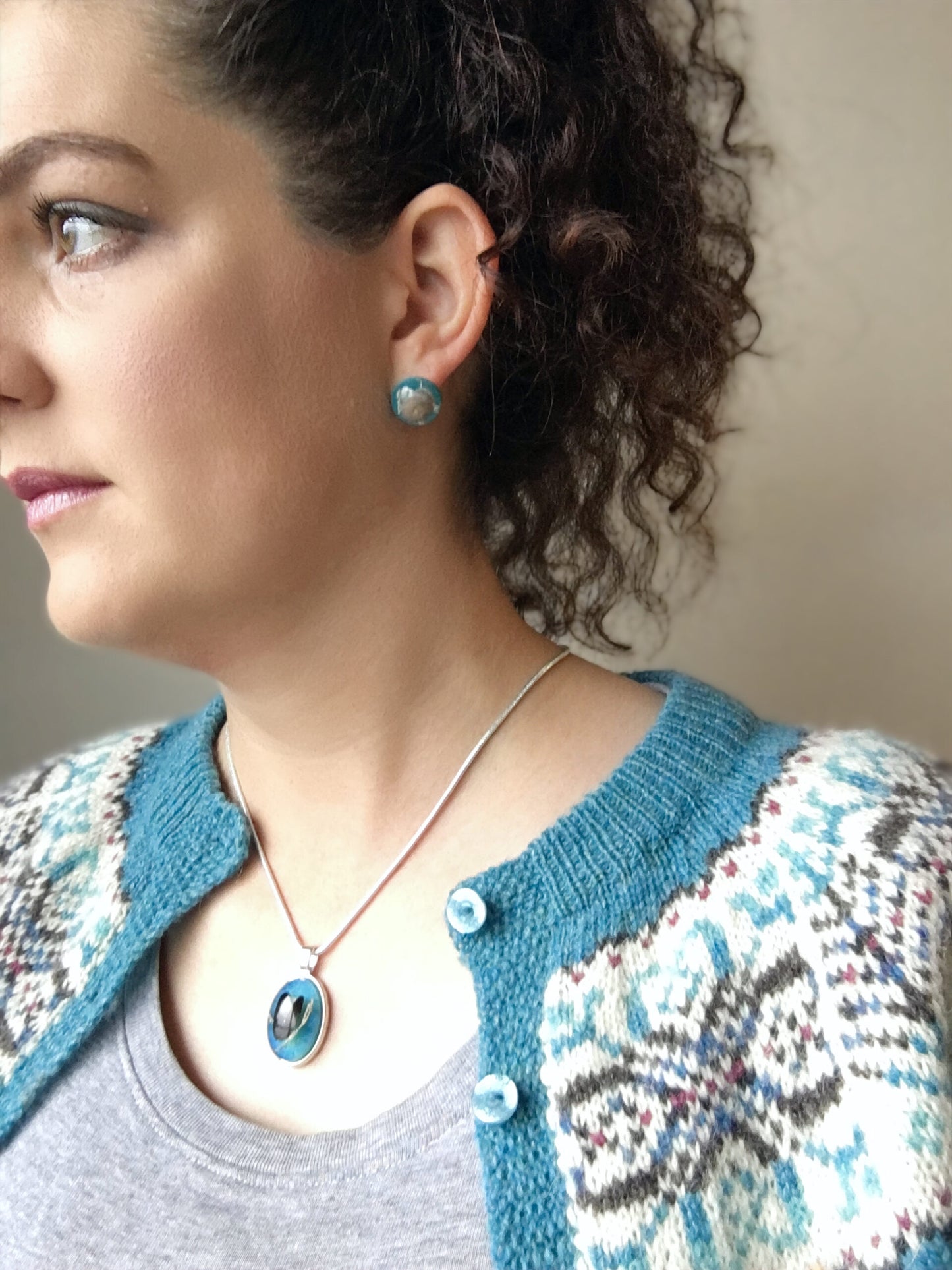 Sea blue beach treasure pendants.