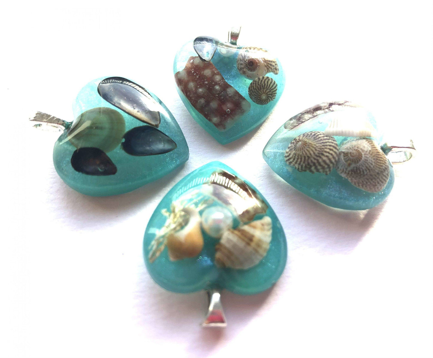 Sea blue beach treasure pendants.