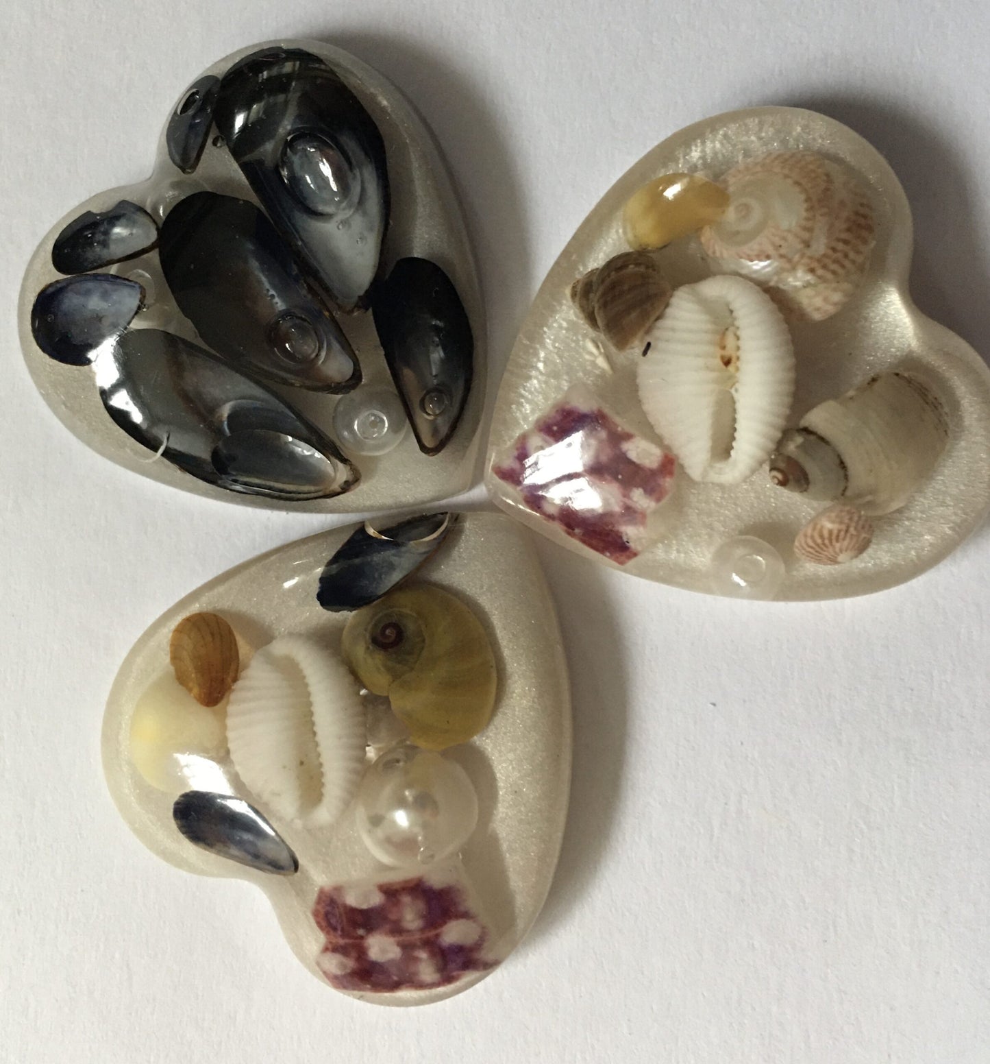 white brooches