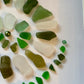 Green sea glass spiral art.