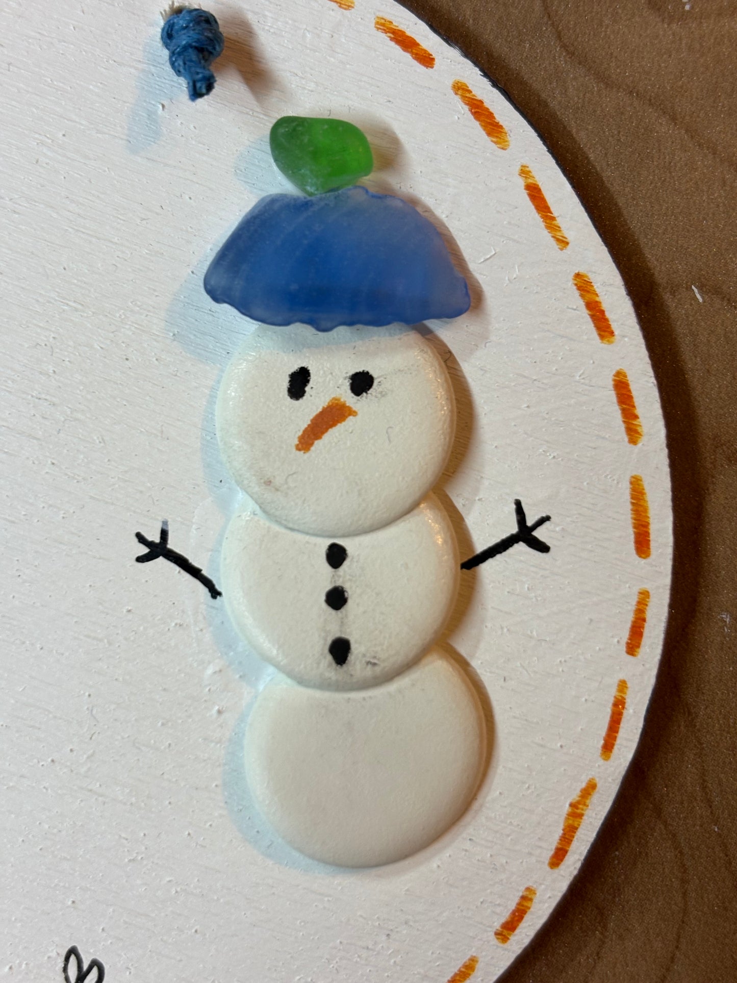 Snow man sea glass hanging plaque.