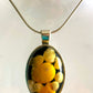 Sunset beach pendants. Yellow shells from the island of Whalsay.