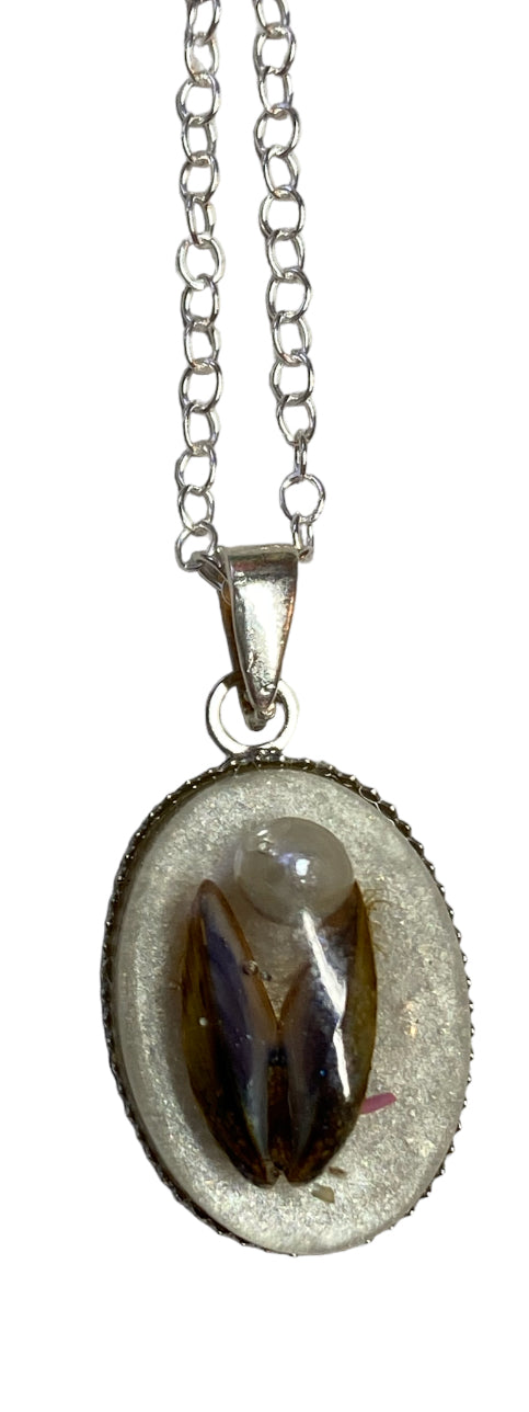 Mussel shell pendant.