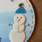 Snow man sea glass hanging plaque.