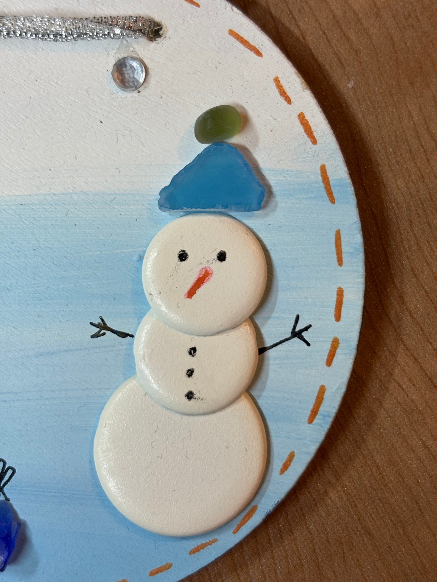 Snow man sea glass hanging plaque.