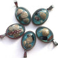 Sea blue beach treasure pendants.