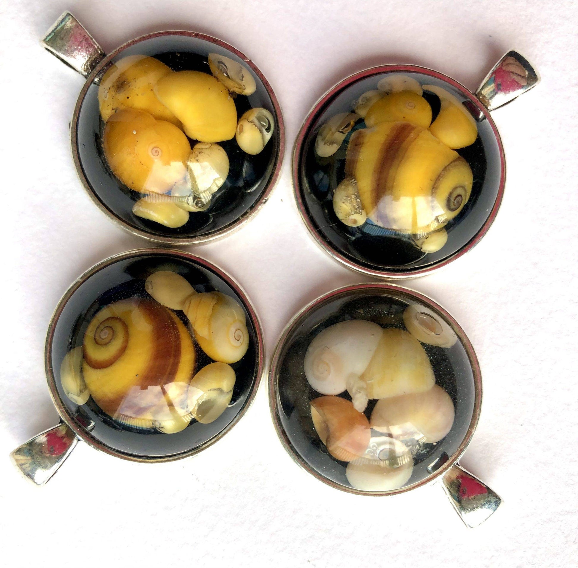 yellow shell pendants