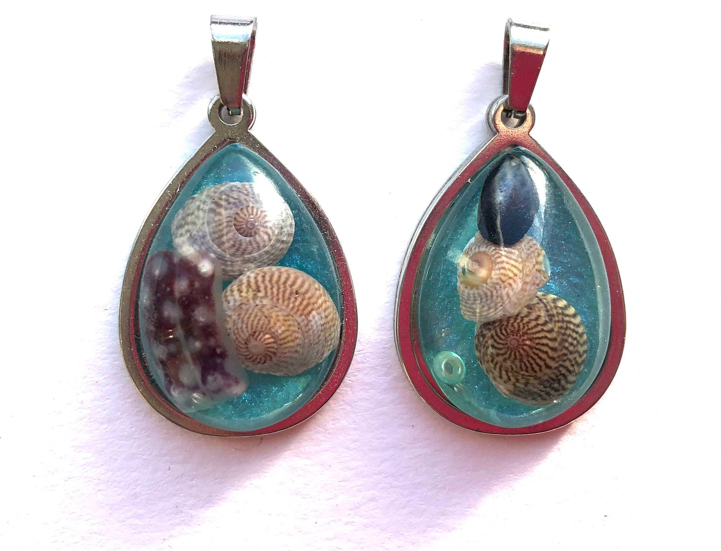 Sea blue beach treasure pendants.